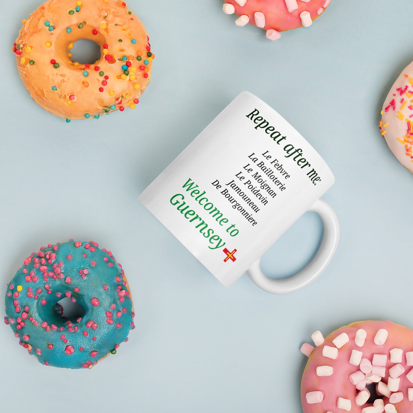 White glossy mug(Repeat after me:  Le Febvre, La Bailloterie, Le Moignan, Le Poidevin, Jamouneau, De Bourgonniere - welcome to Guernsey)