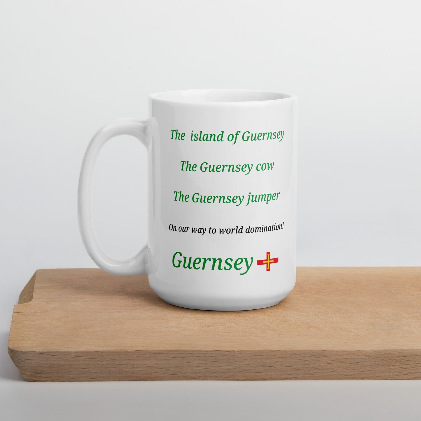 White glossy mug (The island of Guernsey, The Guernsey cow, The Guernsey jumper - on our way to World domination)